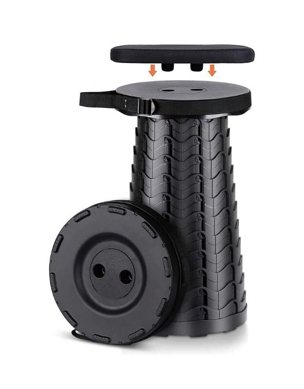 A black foldable telescopic stool with adjustable height mechanism, shown disassembled into three components.